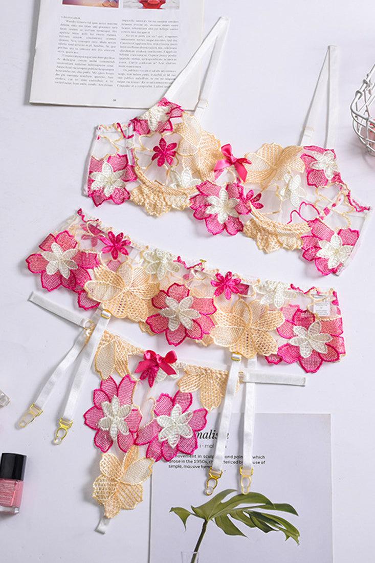 Witte set met bloemenborduur en jarretels – 3‑delige lingerieset