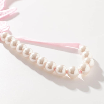 AURANELLE – Verstelbare Tanga met Vlinderdetail en Parelsluiting